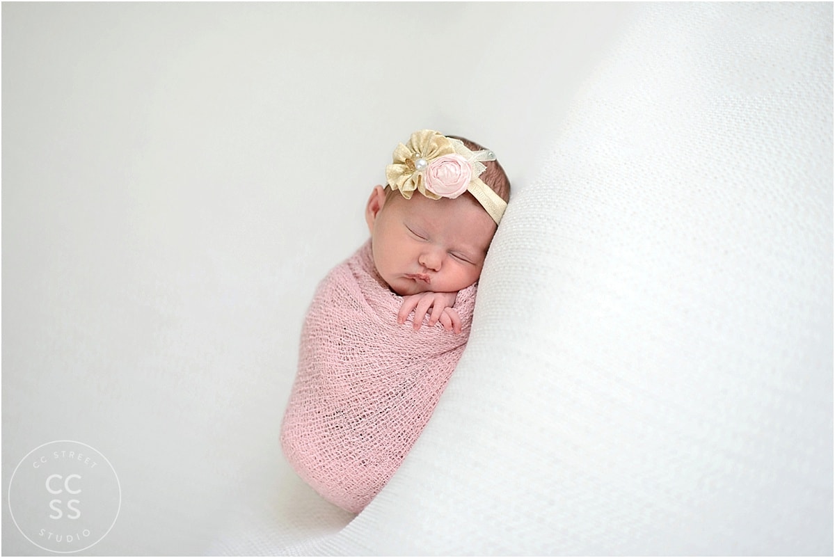 newborn-baby-in-pink-wrap